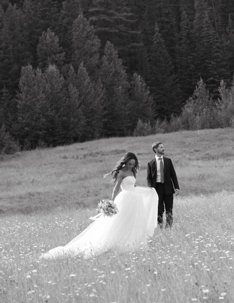 A black and white bridal portrait captures newlyweds before their Tunnel Mountain Reservoir Wedding