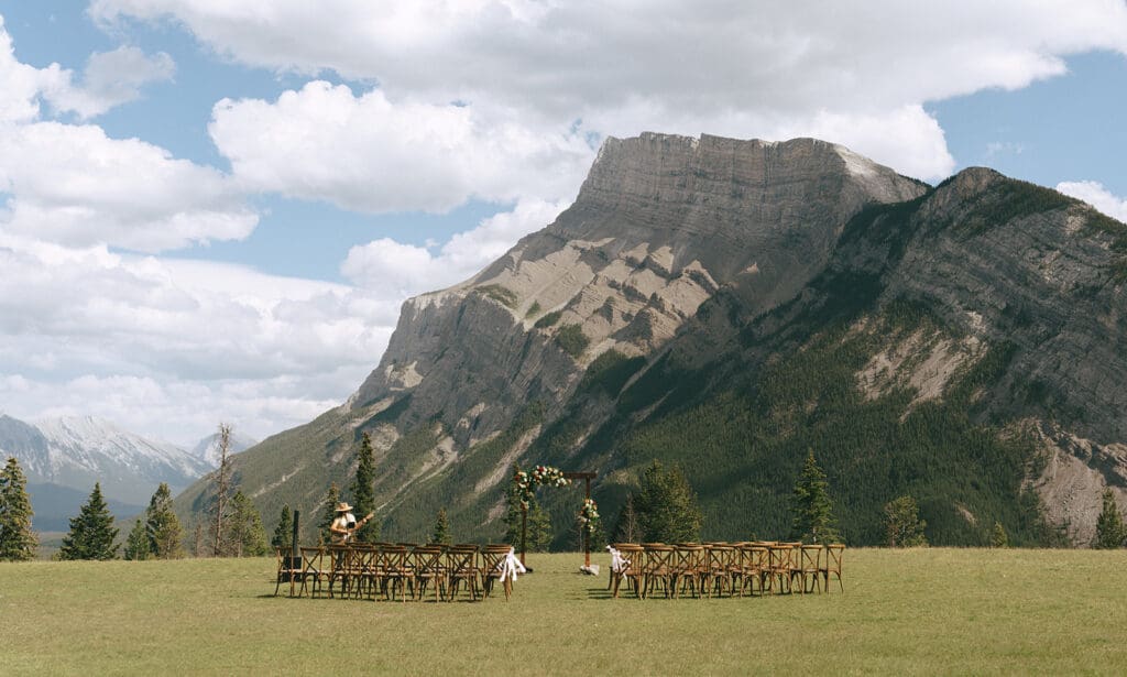 The ceremony site at a Tunnel Mountain Reservoir wedding is photographed