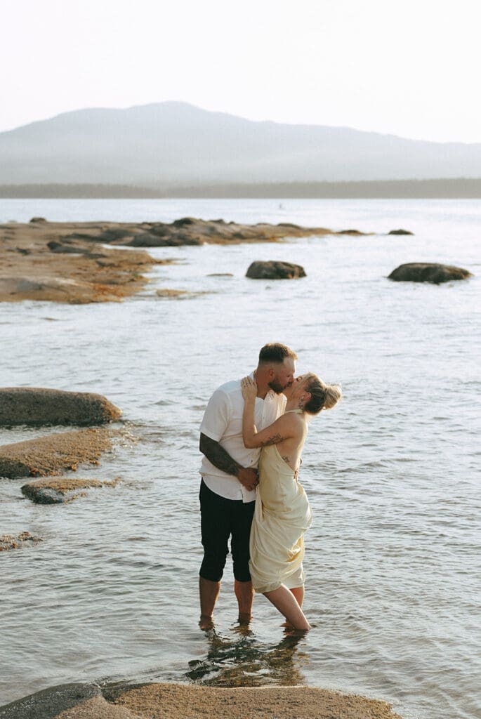 A kiss at Gabriola Island during engagement photos vancouver
