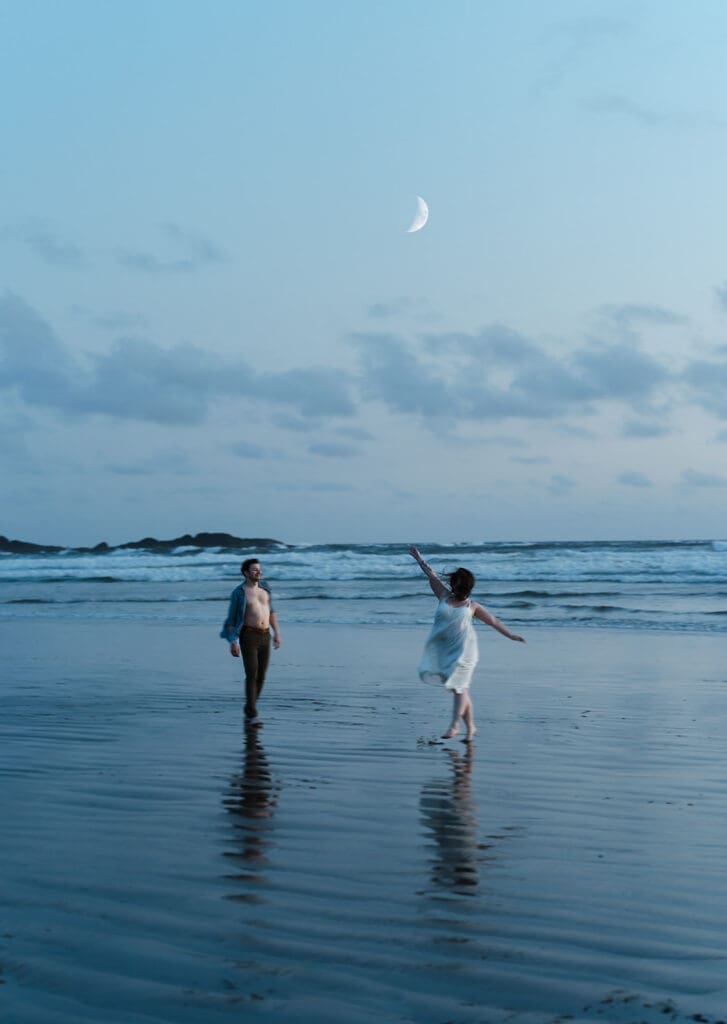 Unique engagement session location in Tofino on Vancouver Island with couple on the beach