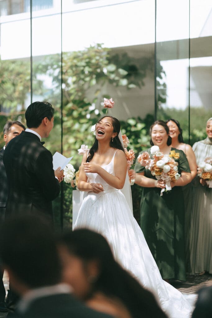 A bride enjoys a toast at her inn at laurel point wedding reception