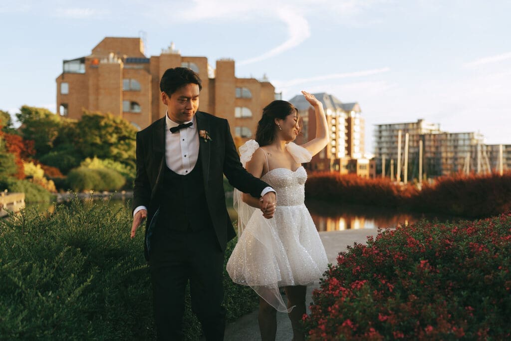 Newlyweds pose for bridal portraits after their laurel point inn wedding