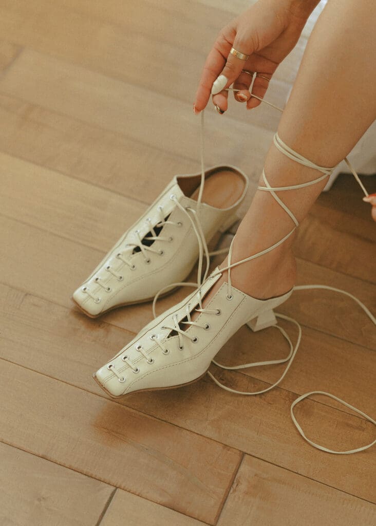 A bride's wedding shoes are photographed at a wedding venue victoria bc