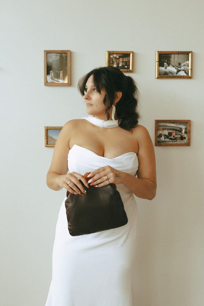 A bride in a strapless gown is photographed before her Hatley Park wedding 