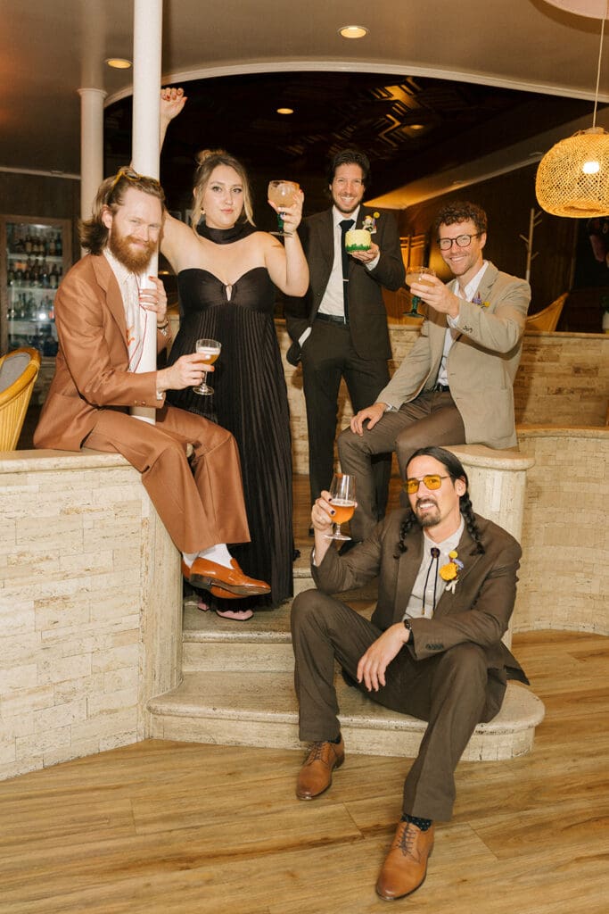 victoria bc wedding photography shows a wedding party at a 70s inspired wedding reception