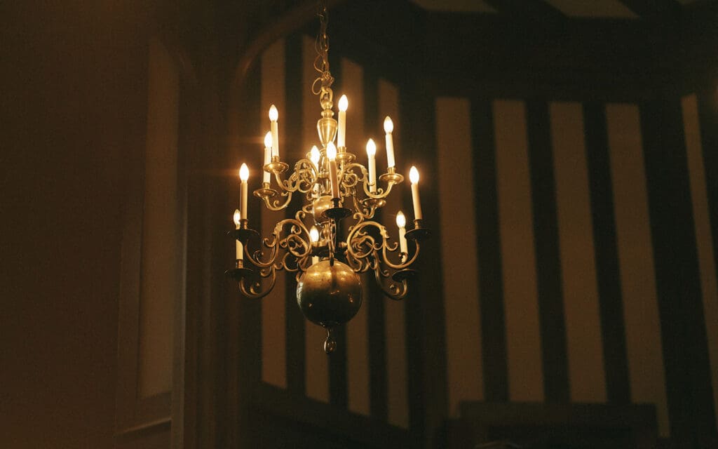 A chandelier is photographed in Hatley Castle, a wedding venue victoria bc